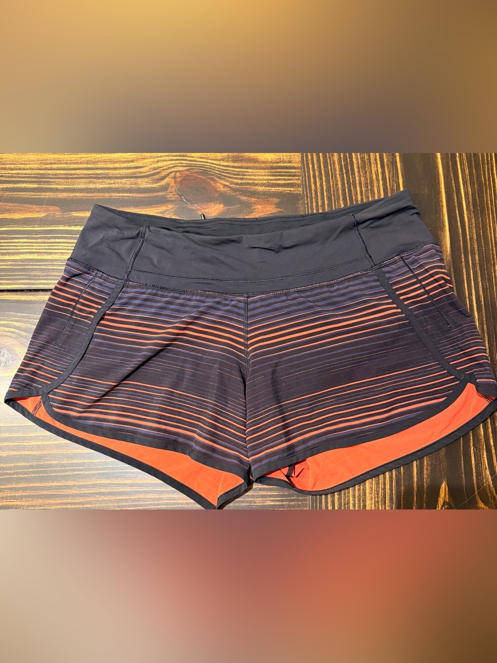 Lululemon Speed Up 4” inseam Shorts - Black with Orange and Blue Stripes